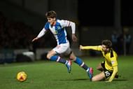 BURTON-UPON-TRENT, ENGLAND-FEBRUARY 24: Connor Mahoney of Blackburn Rovers and Luke Murphy of Burton Albion in action during the Sky Bet Championship match between Burton Albion and Blackburn Rovers at Pirelli Stadium on February 24, 2017 in Burton-upon-Trent, England (Photo by Nathan Stirk/Getty Images).